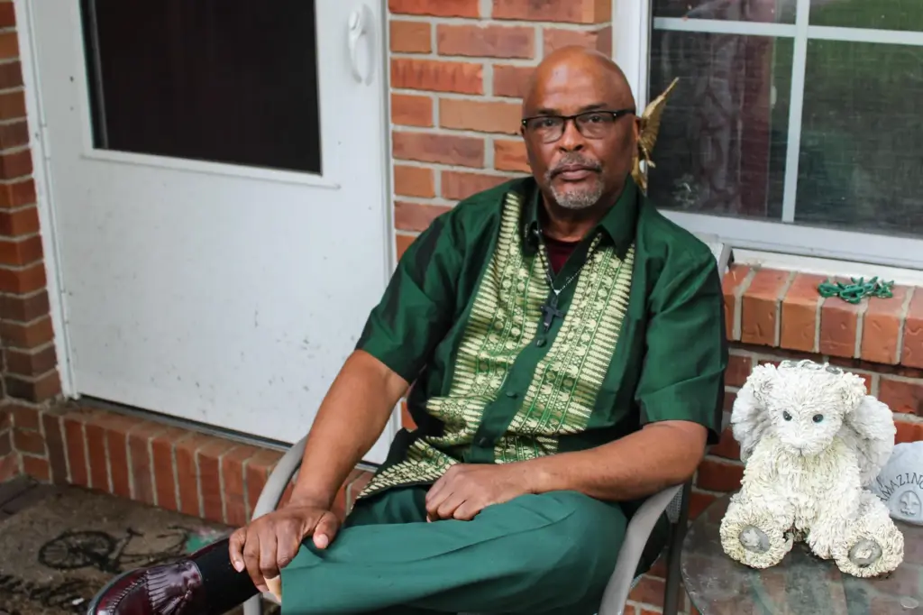 Mark Wiggins, president of the local NAACP branch, poses for a photo.
