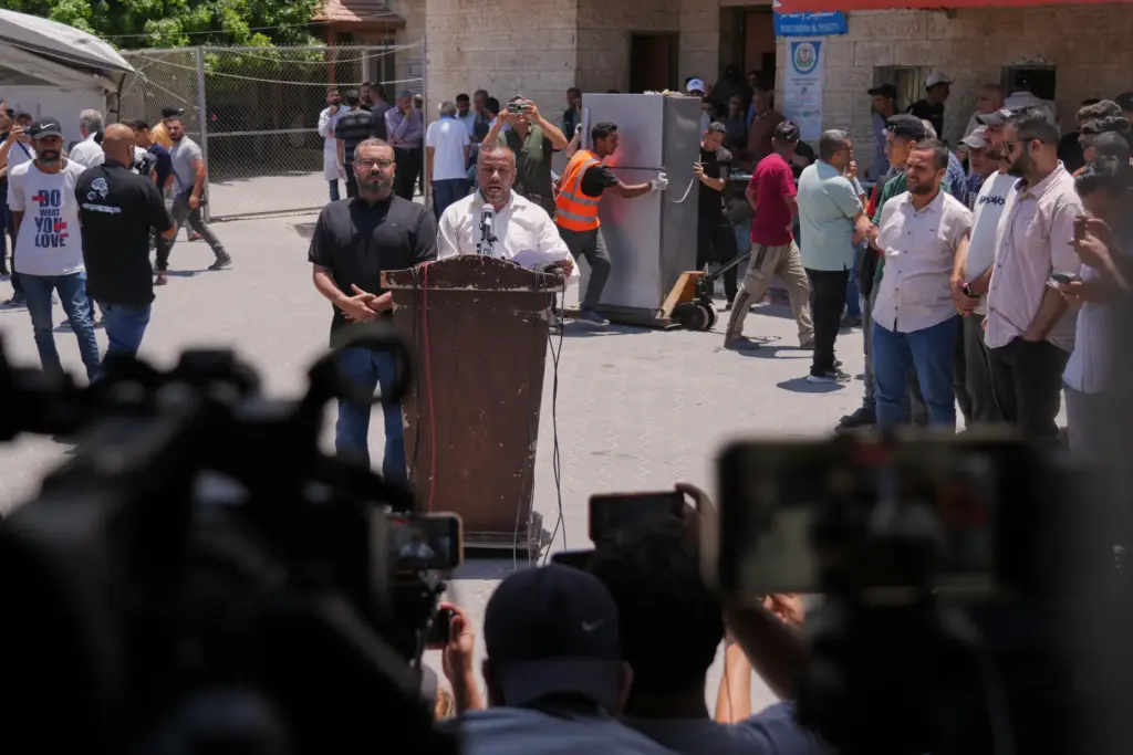 Ismail al-Thawabta speaks during a news conference at Al-Aqsa Hospital.