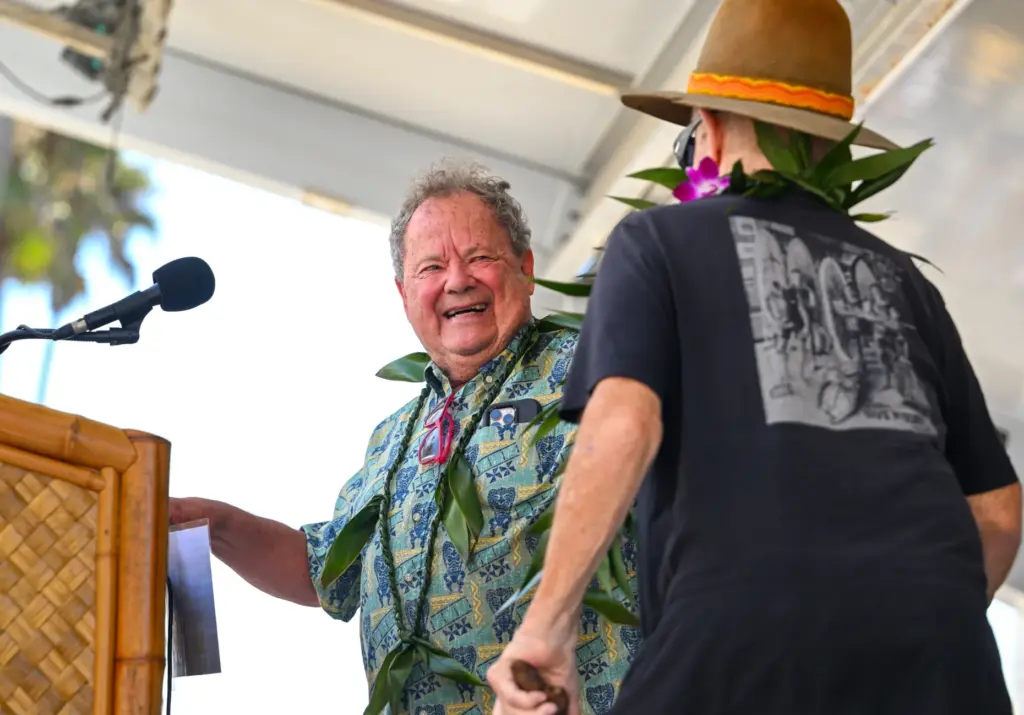 Peter âPTâ Townend welcomes Mike Purpus as Purpus accepts the...