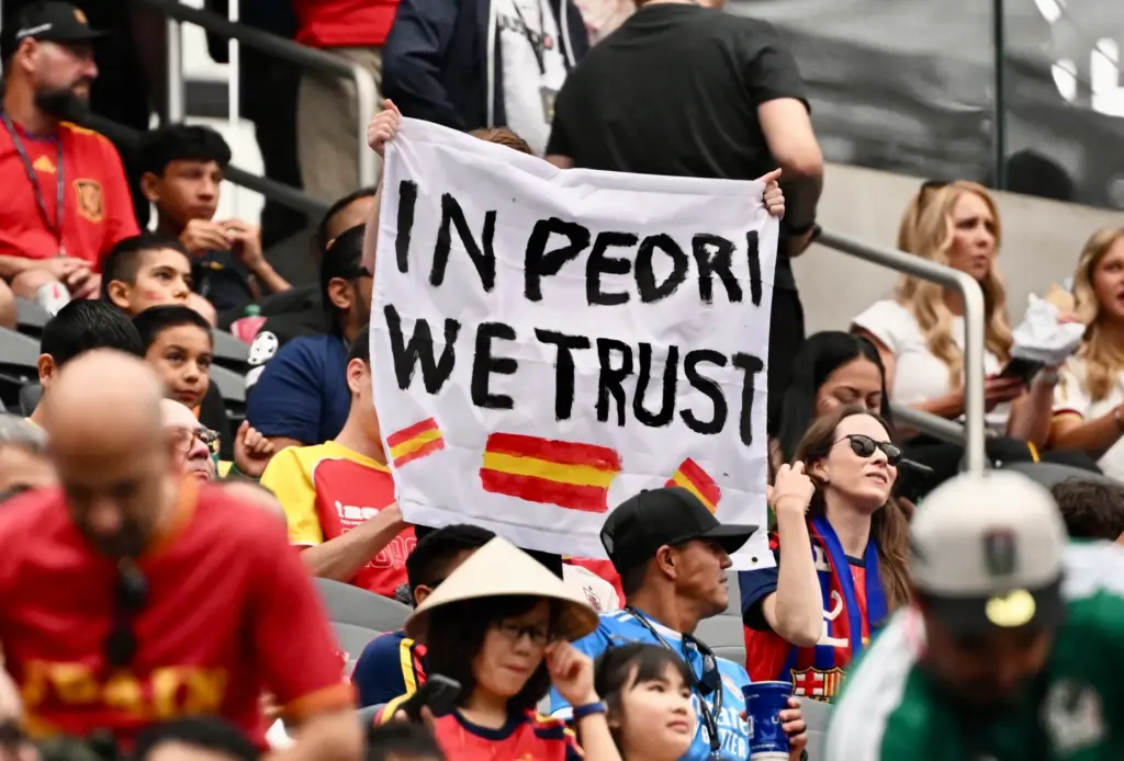 Spain fans wave flags prior to a FIFA World Cup...