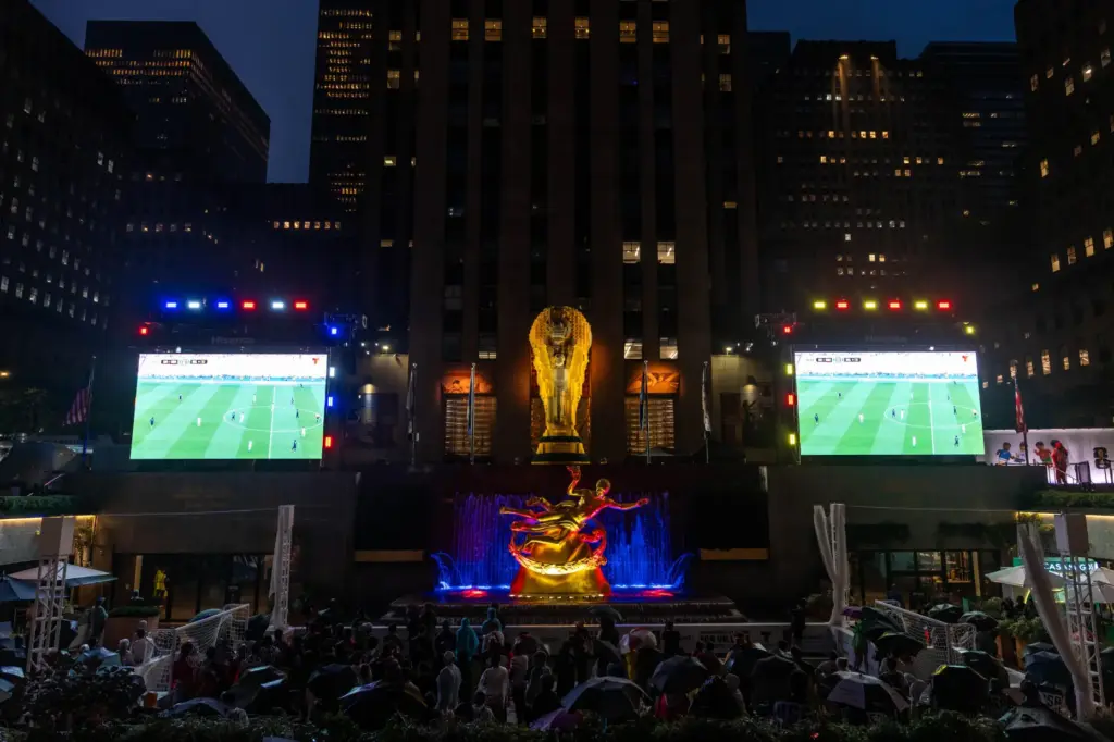 Fans watch the World Cup round of 16 soccer match between the United States and Belgium.