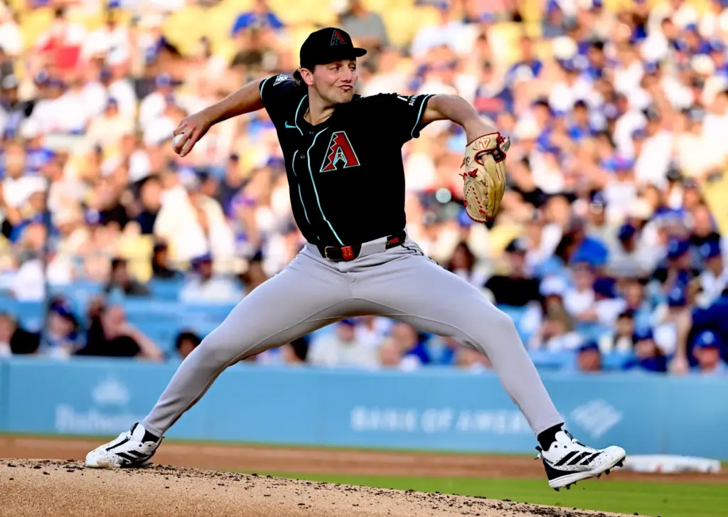 Starting pitcher Brandon Pfaadt of the Arizona Diamondbacks throws to...