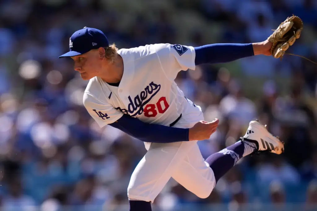 Dodgers starting pitcher Emmet Sheehan throws to the plate during...