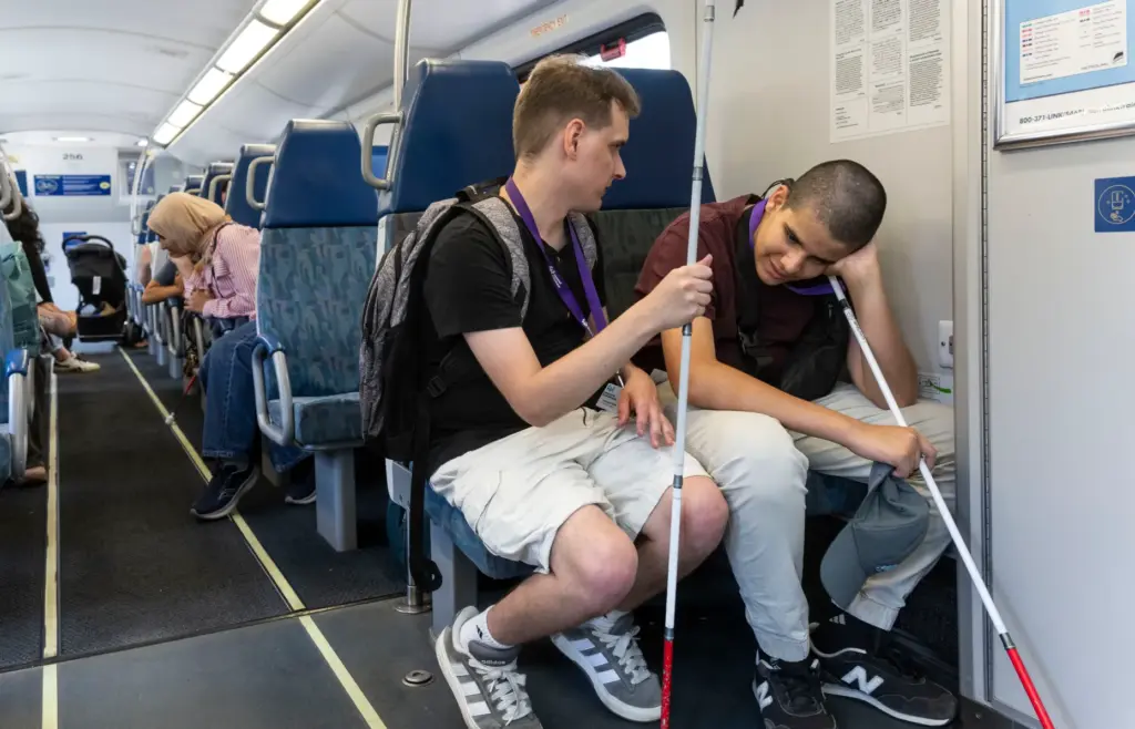 Campers Brandon Reed, left, and Jaber Jaber talk on the...