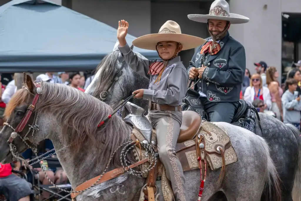 Members of a Vaquero equestrian group participate in the annual...