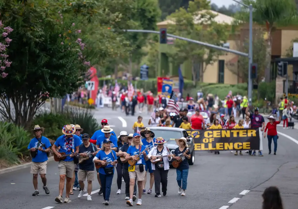 The Aloha Strummers ukulele group perform as they make their...