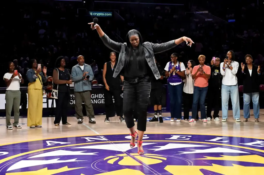 Former Sparks star DeLisha Milton-Jones dances during her jersey retirement...