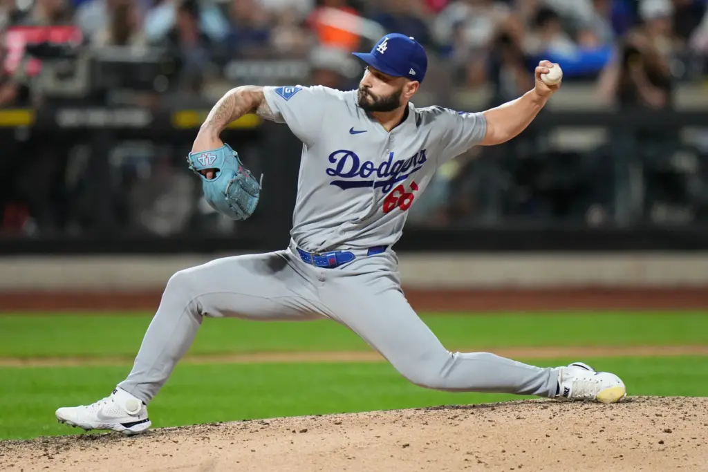Dodgers’ Tanner Scott pitches during the ninth inning of a...