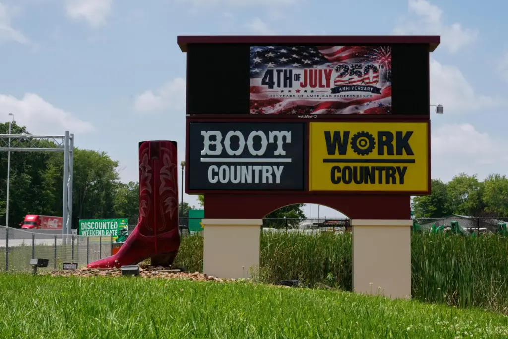 Boot Country Work Country’s electric sign reads “4th of July...