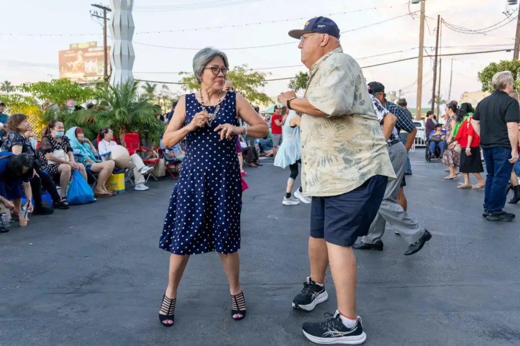Anh Nguyen (left) dances with her brother-in-law Tony Dudys while...