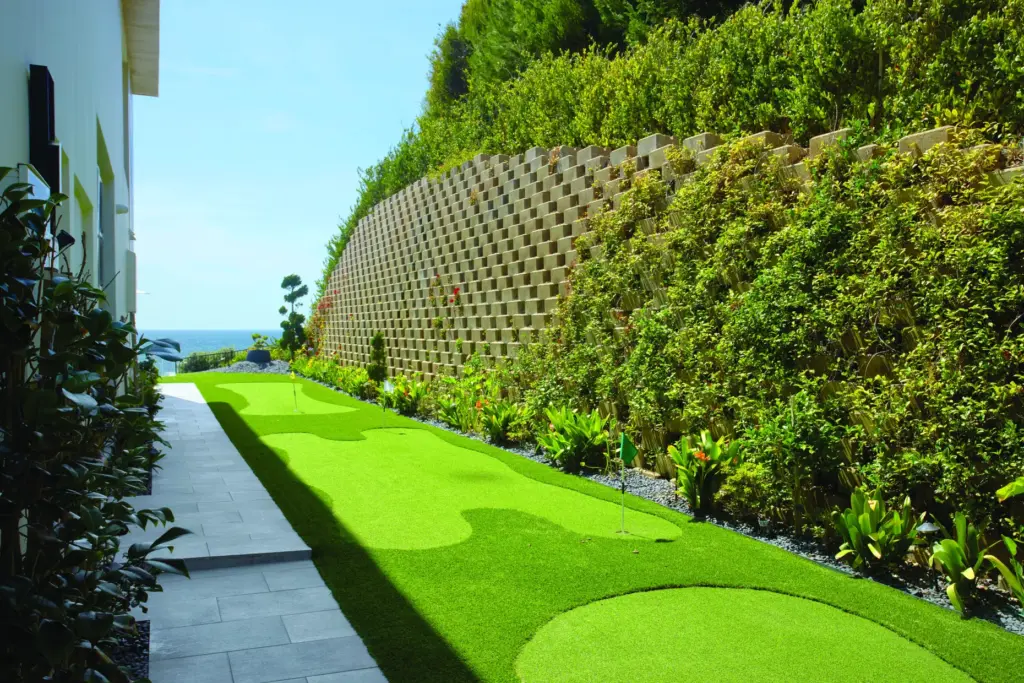 The putting green lines the side of the property. (Photo...