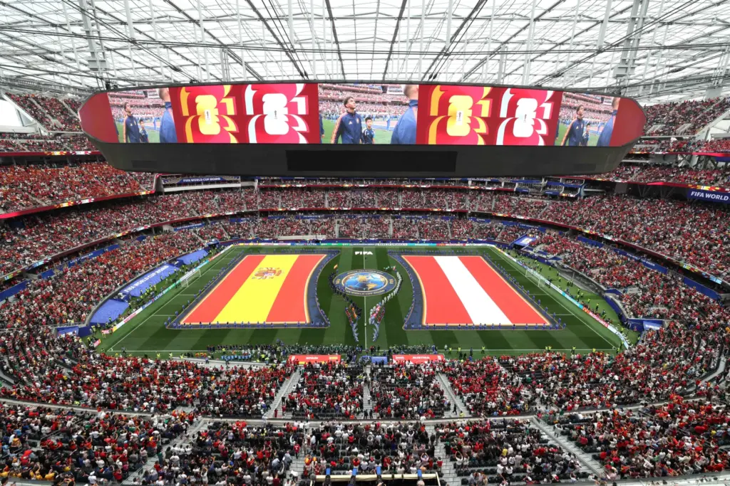 Spain and Austria players come on to the pitch prior...