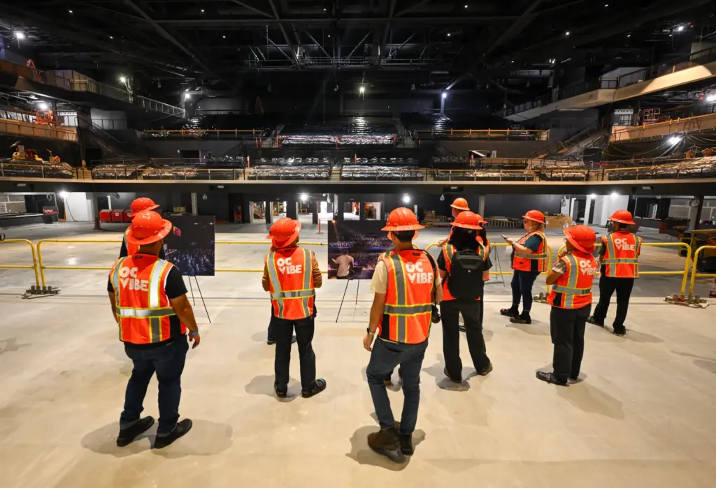 Visitors tour construction at the new concert hall at OC...