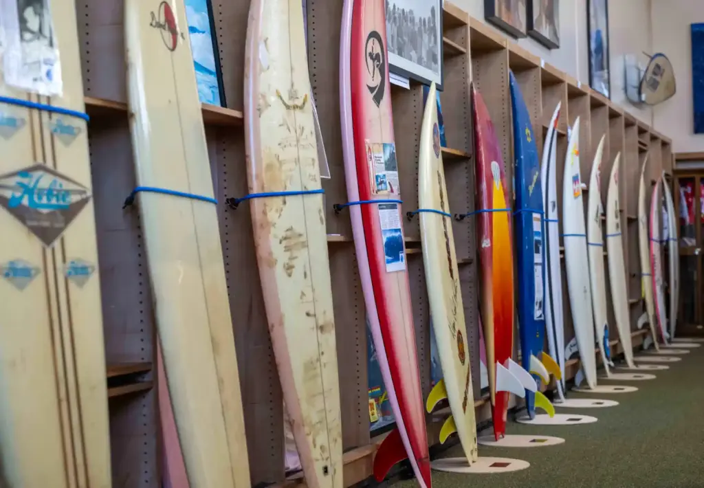 A display of surfboards ridden by some of the world...