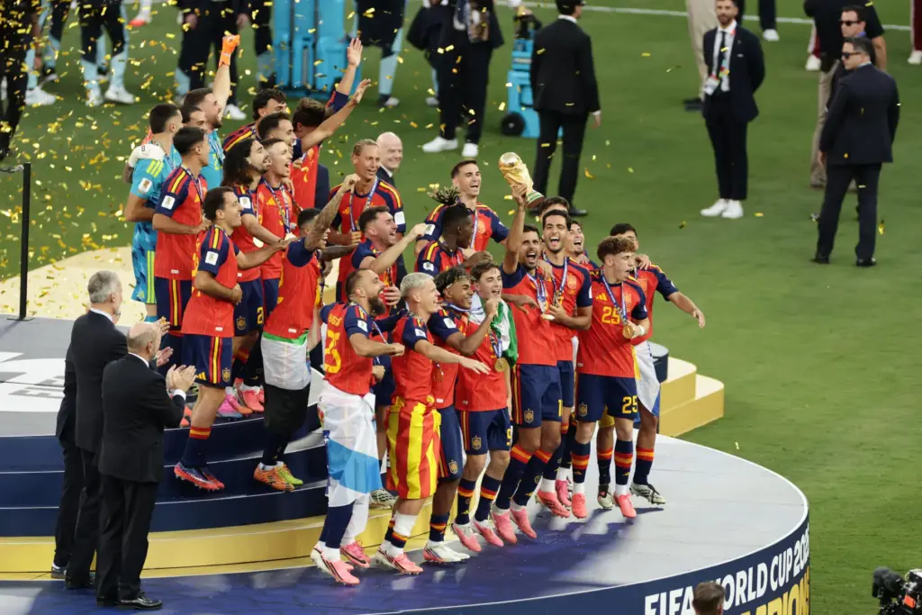 Spain celebrates with the trophy after the World Cup final.