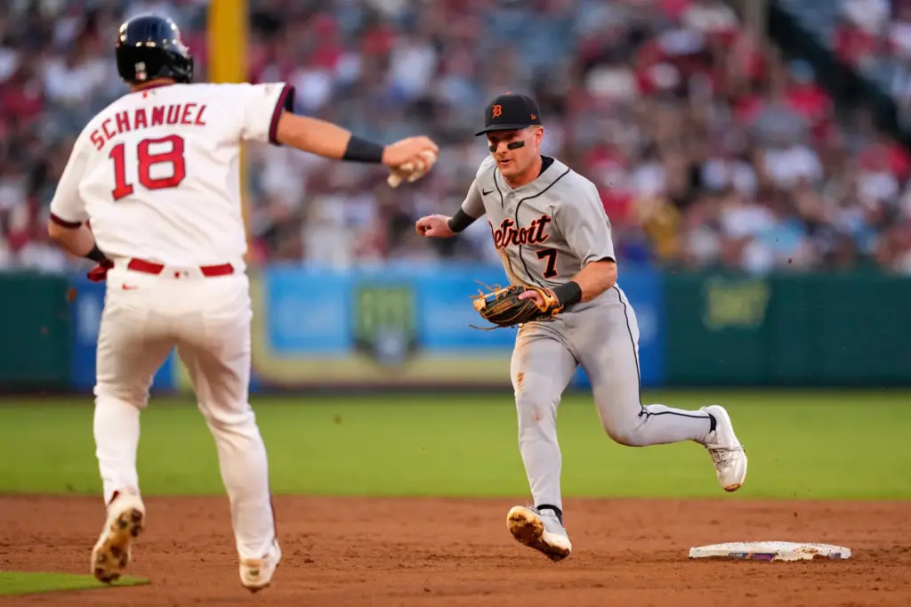 Detroit Tigers shortstop Kevin McGonigle, right, forces out Angels’ Nolan...