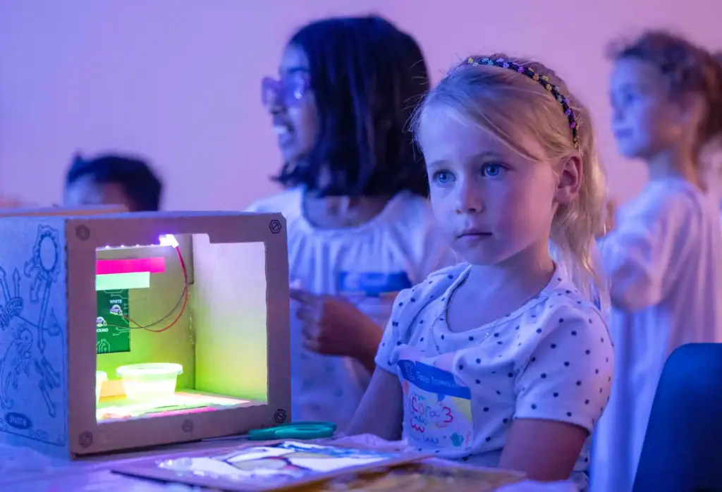Cora Butterfield, 6, of Ladera Ranch works on creating a...