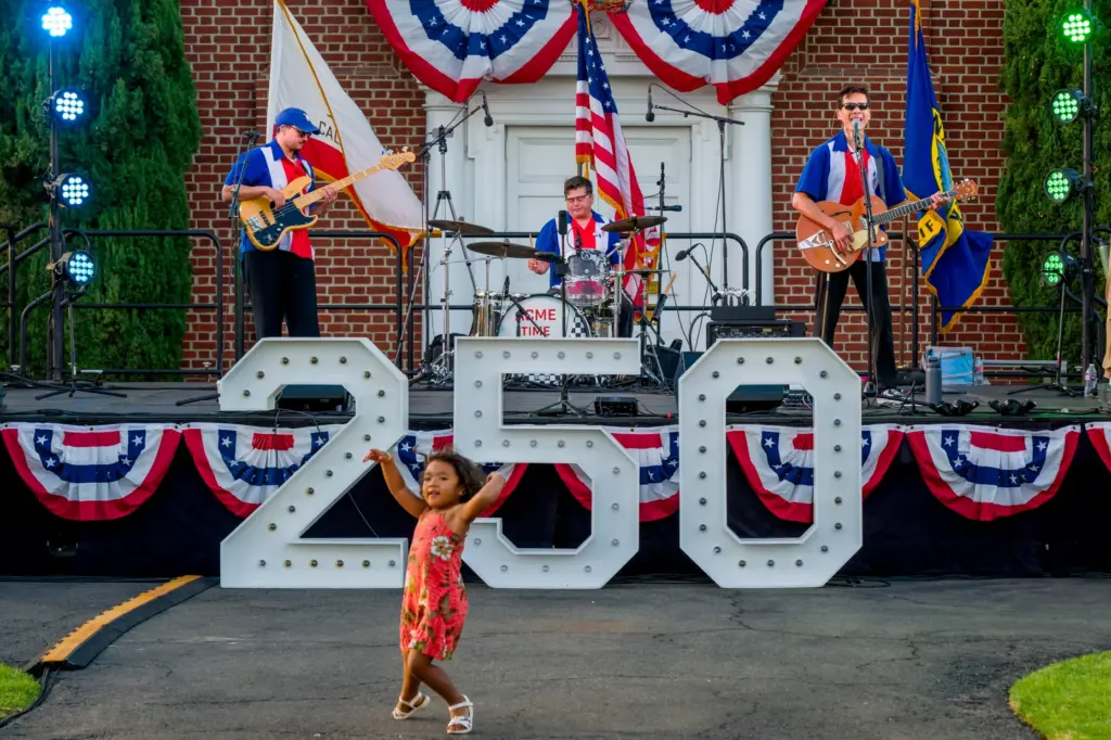 The band, Acme Time Machine, performs during the America’s 250th...