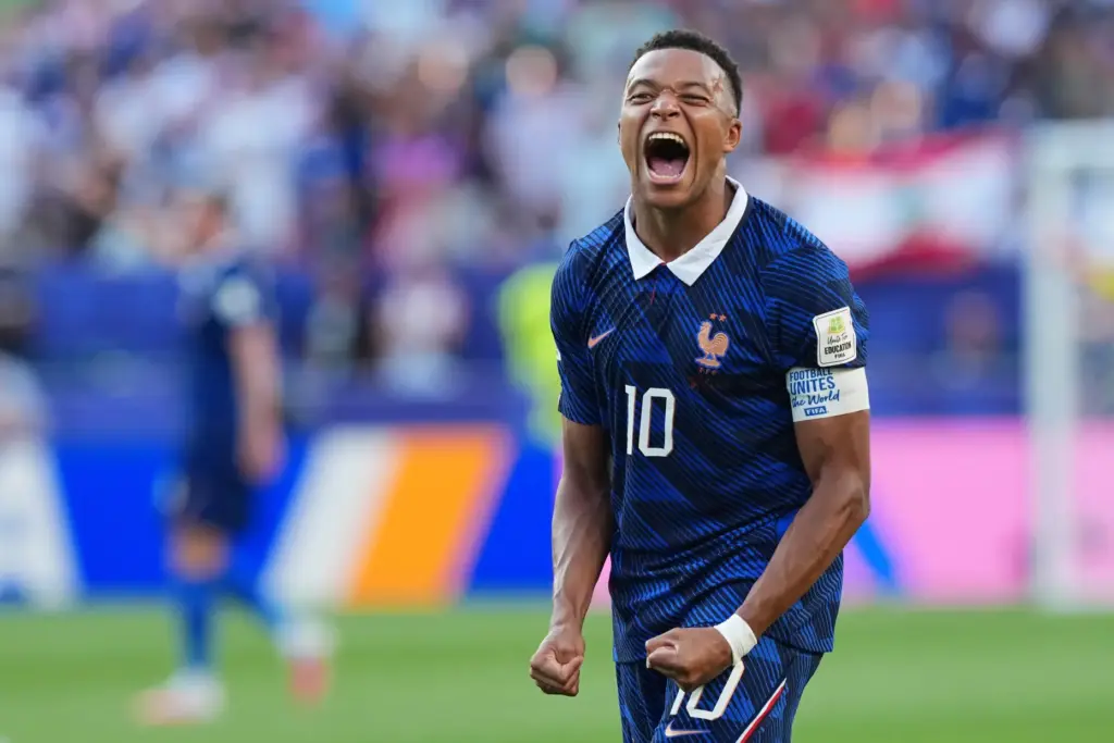 France's Kylian Mbappe celebrates his team's victory against Paraguay.