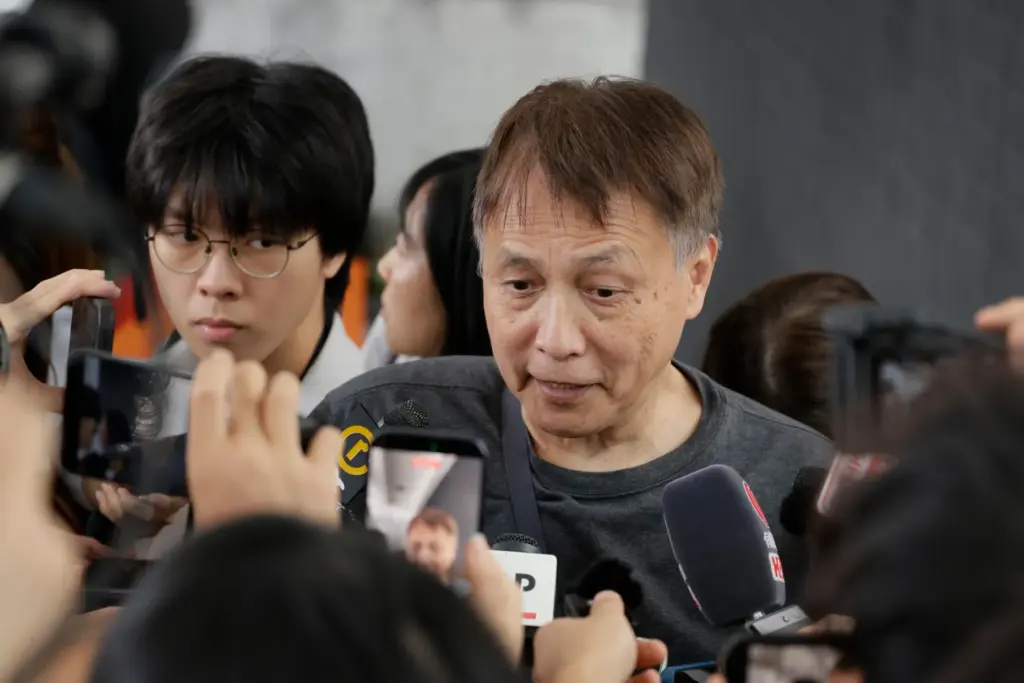 Lee Kwok-hung speaks to the media following closing submissions.