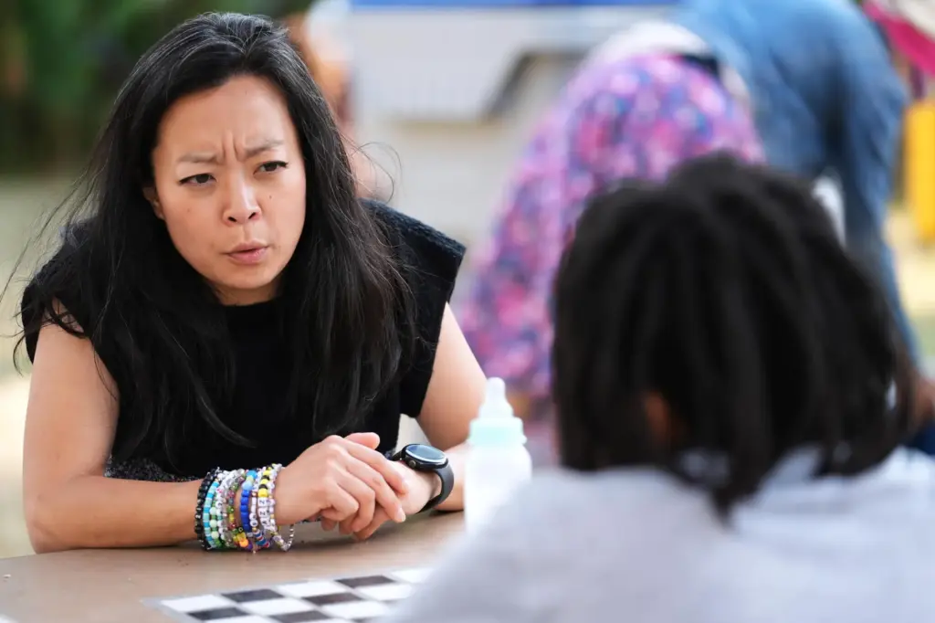 Democratic gubernatorial candidate Francesca Hong talks with a Milwaukee resident.