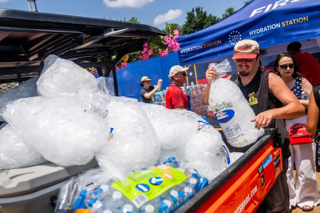 Vendors distribute ice at the Great American State Fair on...
