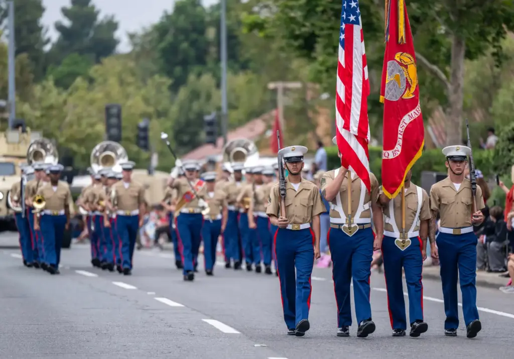 A First Marine Division color guard and marching band participates...