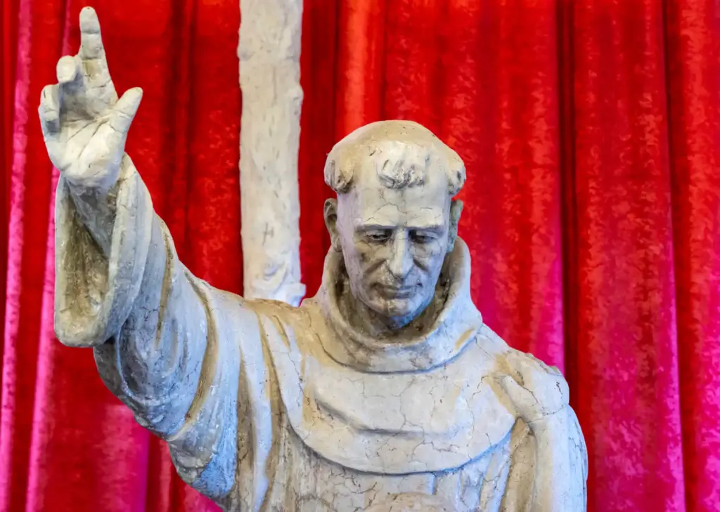 A statue of St. Junipero Serra greets visitors in a...