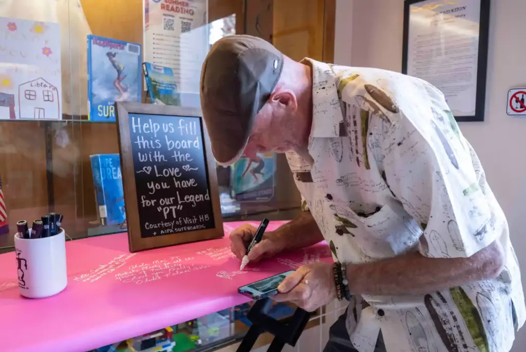 Phil Roberts, a surf artist being inducted into the Surfing...