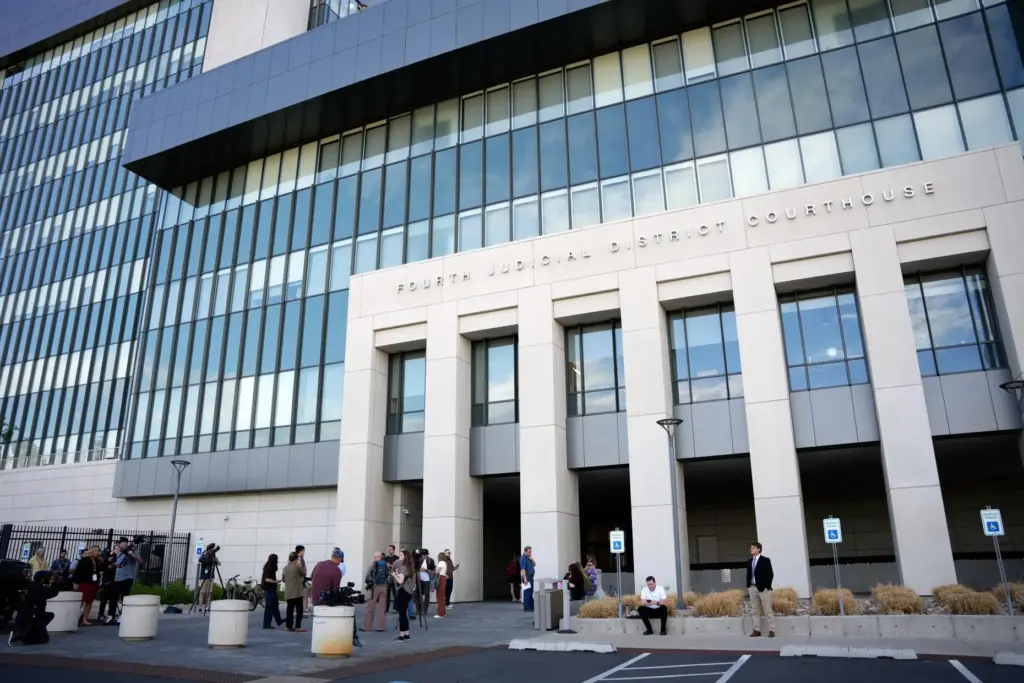 Reporters wait outside the Fourth District Courthouse.