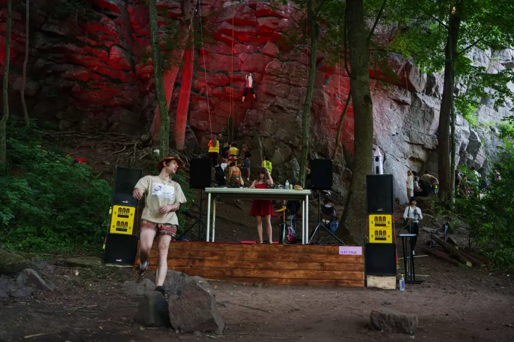 A woman plays a dj set during the Stoned Climbers...