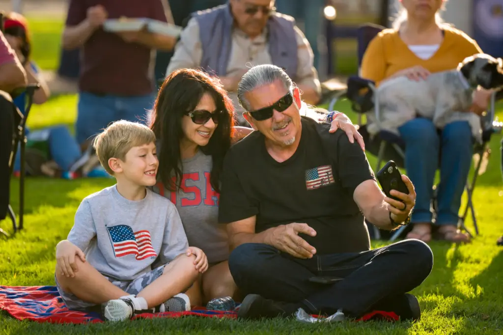 Matthew Carlson, 8, left, and his grandparents Dana and Rick...