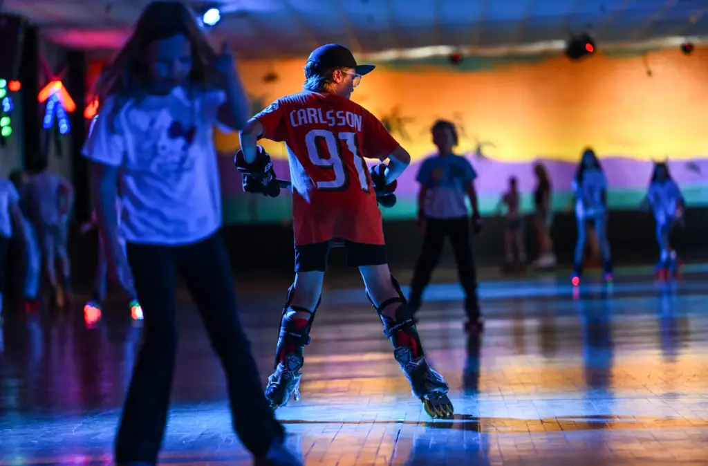 Hockey player Carter Patterson, 11, works out on rollerblades at...