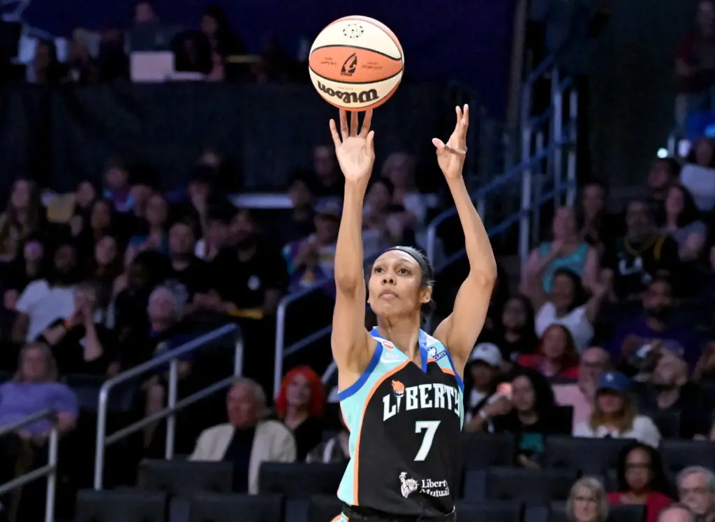 New York Liberty guard Rebekah Gardner takes a 3-point shot...