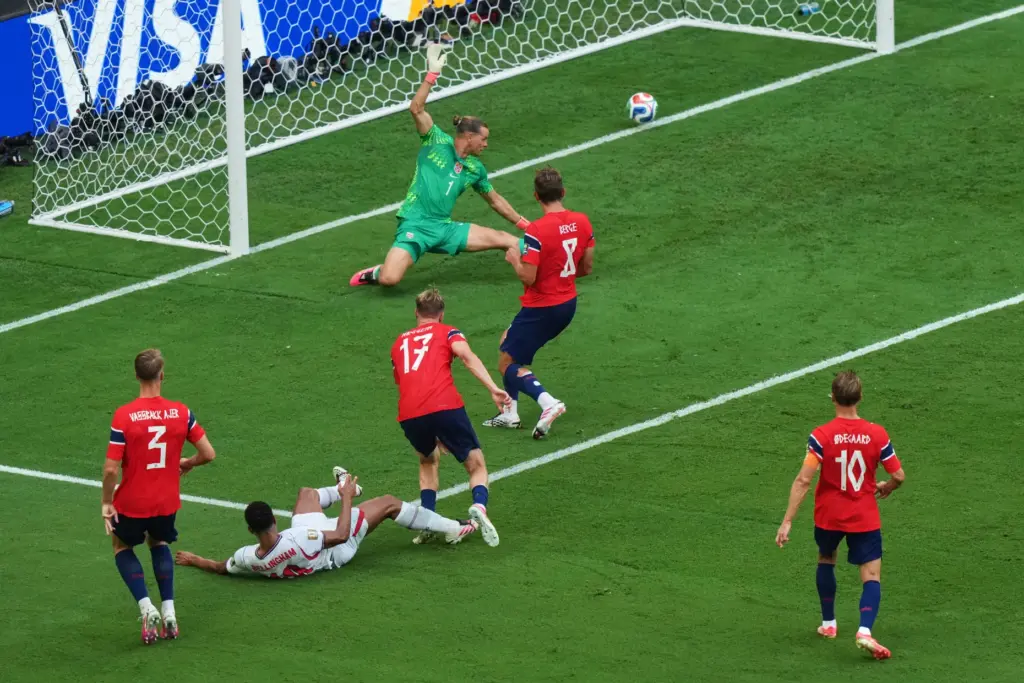 England’s Jude Bellingham, second from left, scores against Norway goalkeeper...