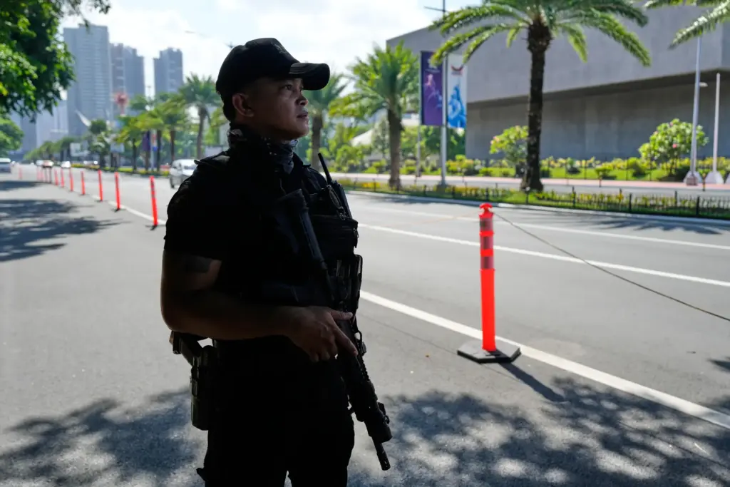 Police patrol outside the venue of the 59th ASEAN Foreign Ministers' Meeting.