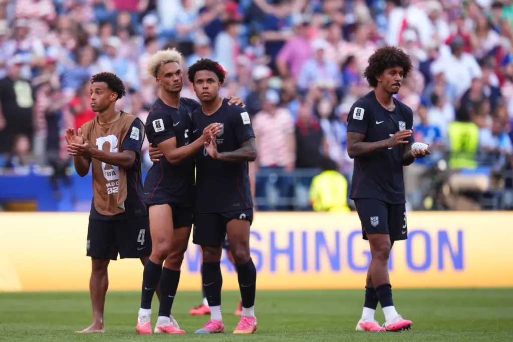 Players of the United States react after the World Cup...
