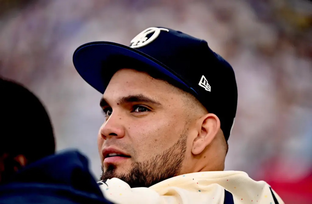 Eliezer Alfonzo of the Dodgers looks on in the fourth...