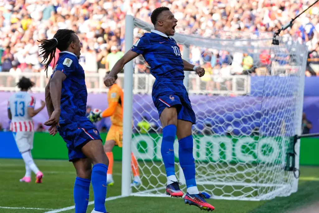 France’s Kylian Mbappe celebrates after scoring from the penalty spot...