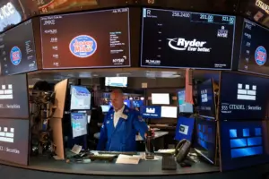 Wall Street rises as Amazon and chip stocks jump, even as oil prices add to worries about inflation