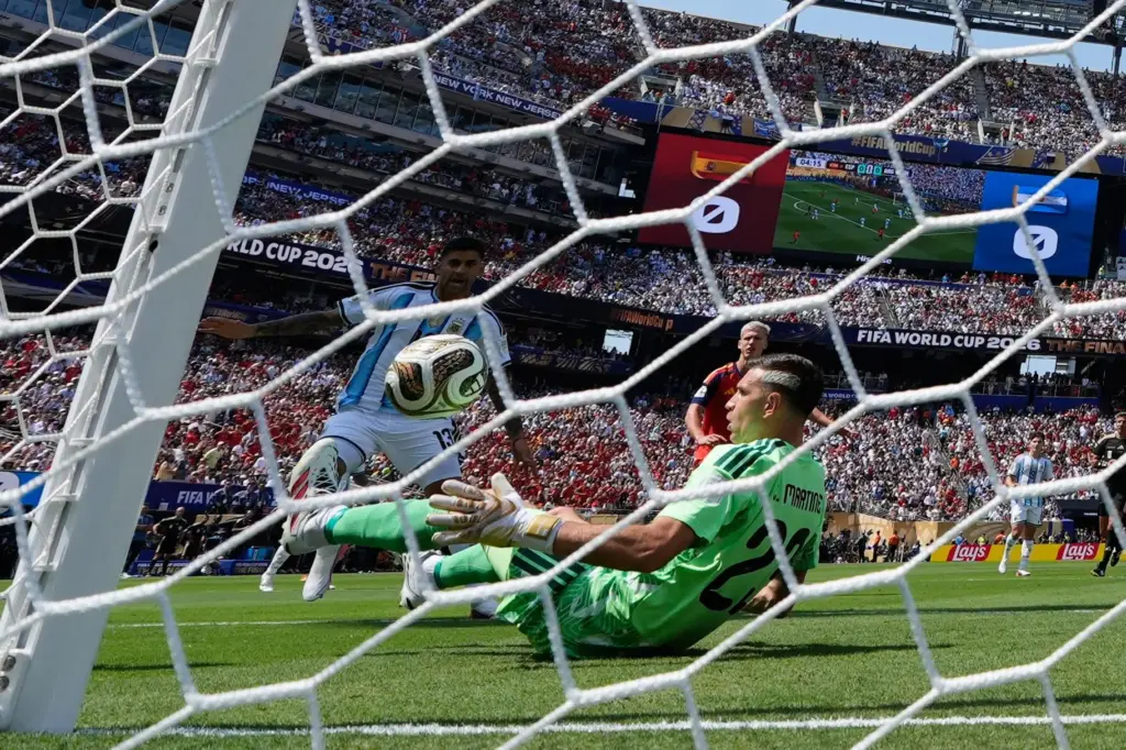 Argentina goalkeeper Emiliano Martinez (23) makes a save during the...