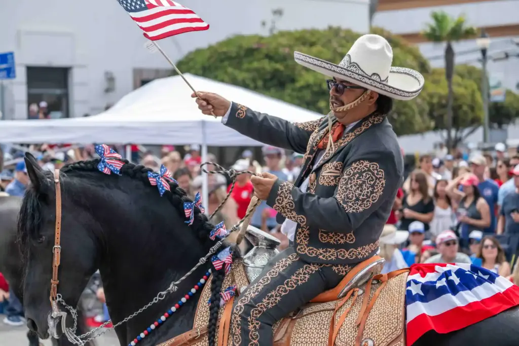 Members of a Vaquero equestrian group participate in the annual...