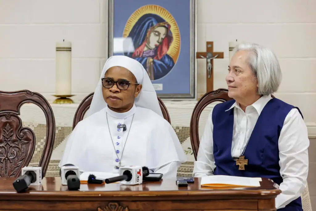 Sister Leticia “Letty” Ugboaja, left, accompanied by Executive Director of...