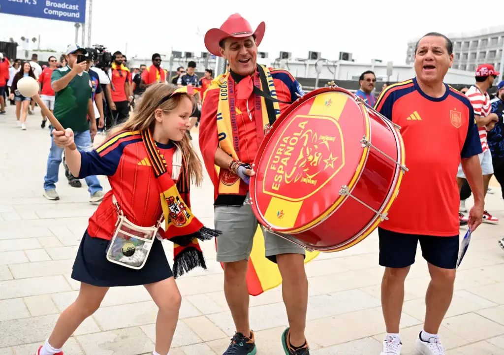 Spain fans get excited for their match against Austria at...