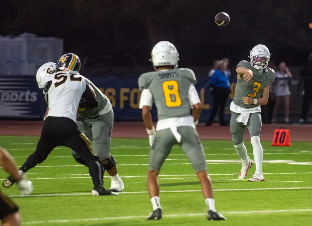 Crean Lutheran quarterback Caden Jones throws the ball during a...