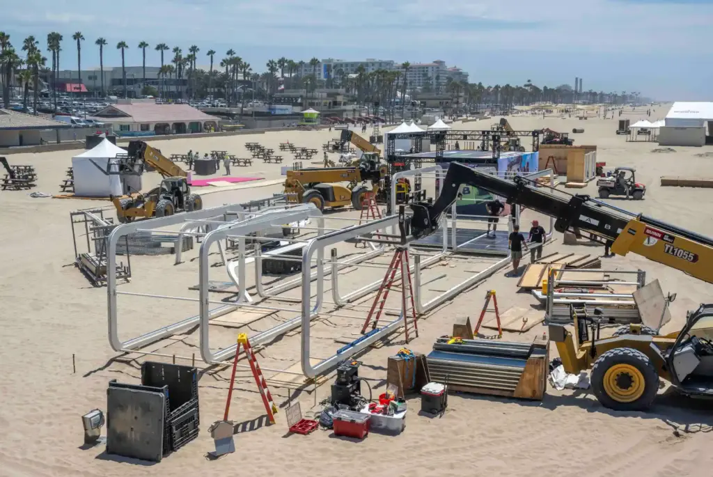 Workers construct the elaborate infrastructure for the upcoming US Open...