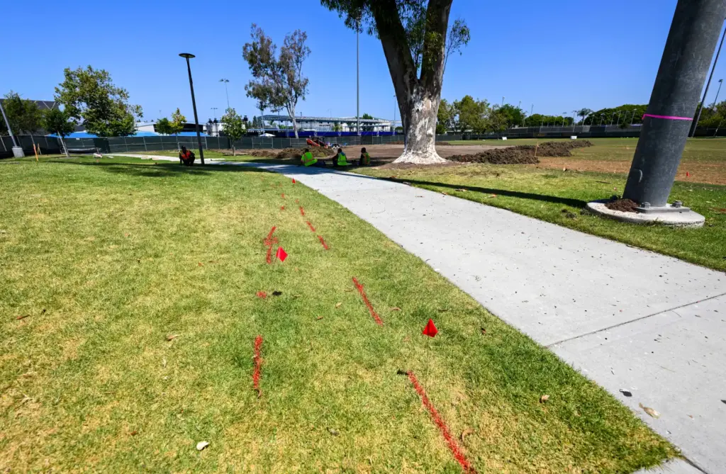 Marks on the ground for construction during the expansion of...