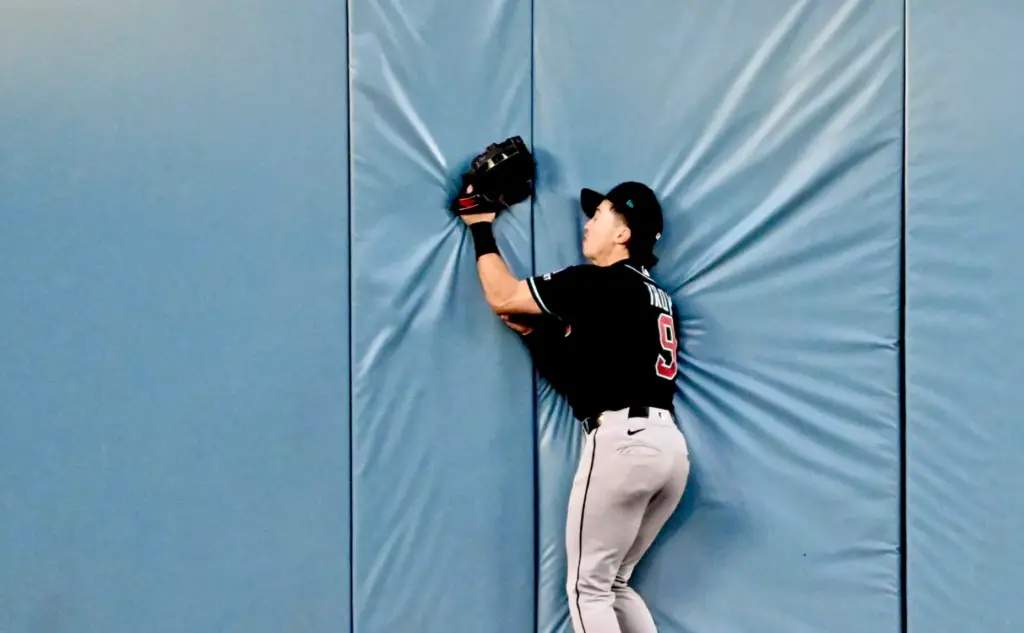 Centerfielder Tommy Troy of the Arizona Diamondbacks catches a drive...