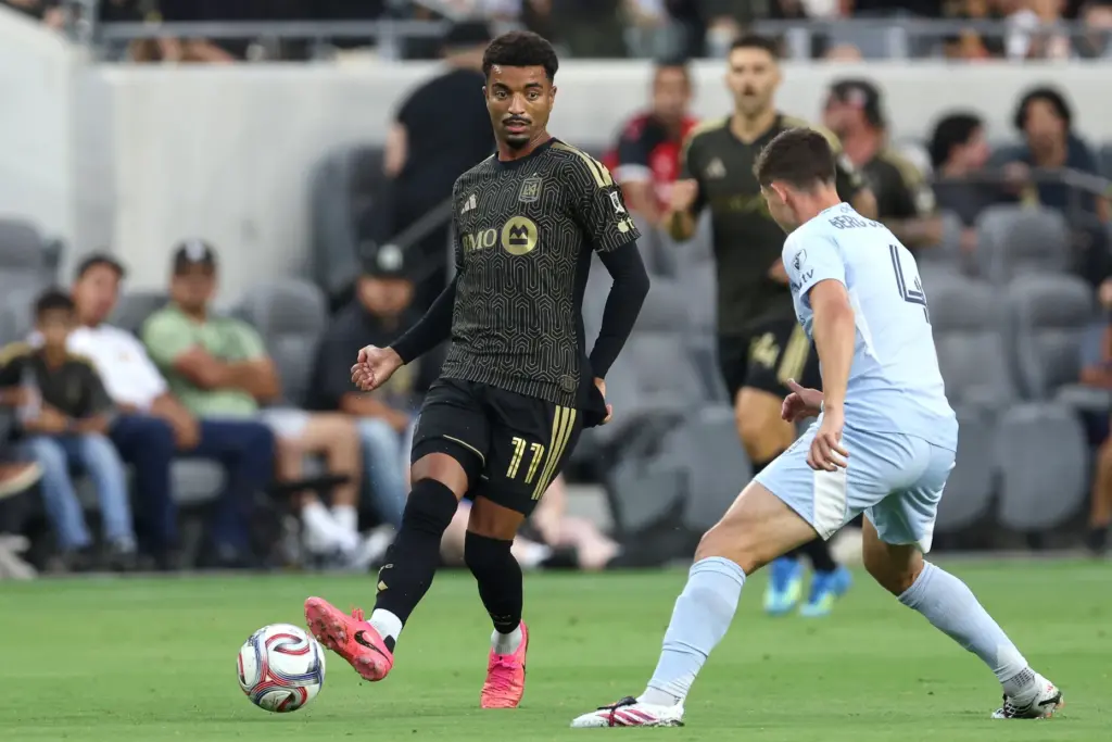 Los Angeles FC midfielder Timothy Tillman (11) kicks the ball...