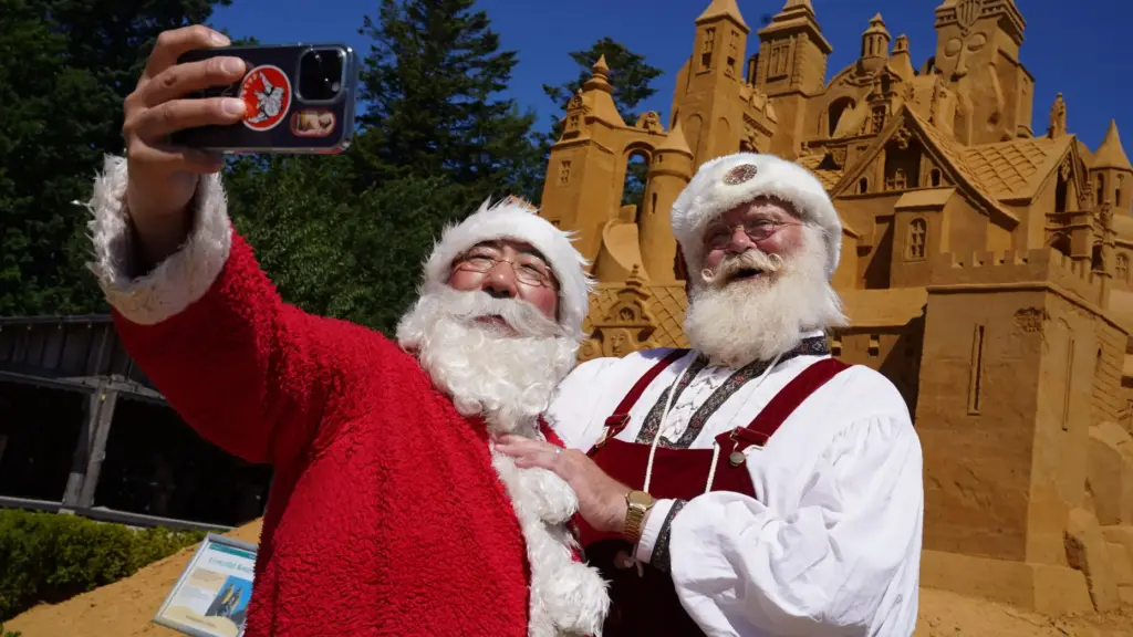 Paradise Yamamoto and Peter Gislund take a selfie during the annual World Santa Claus Congress.